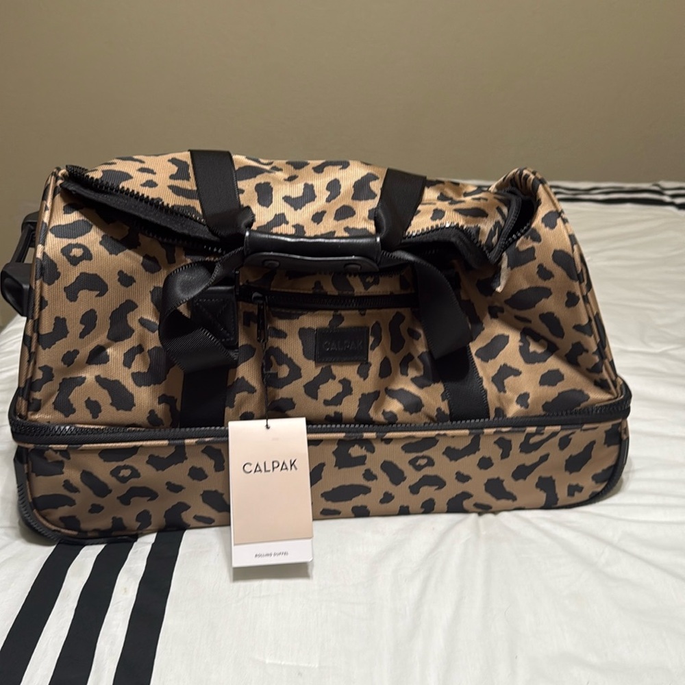 Brand new Calpak rolling Duffel bag with tags